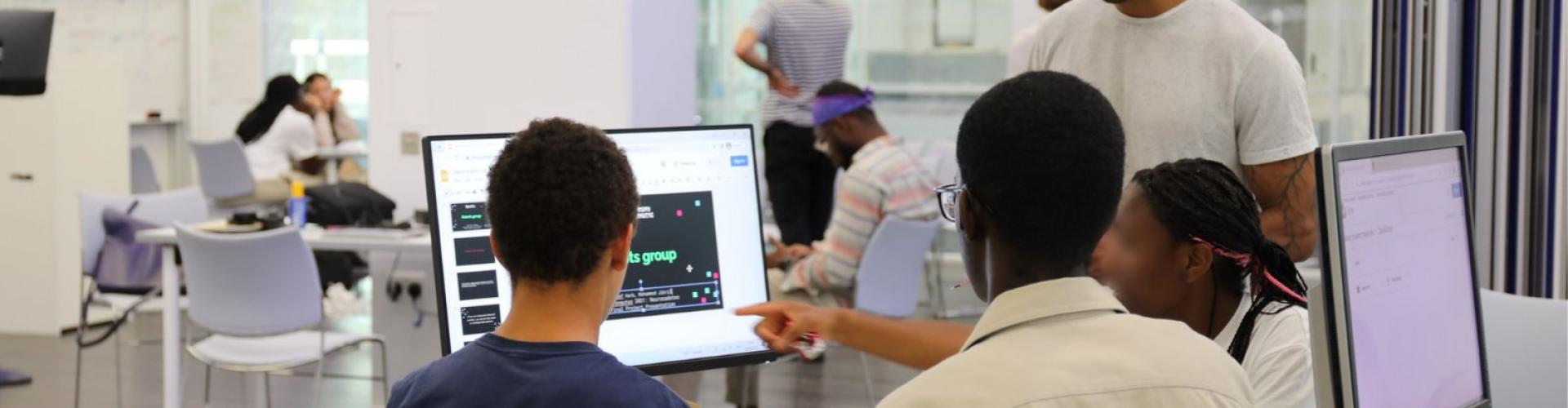 Jai Bhagat teaching three Neuronauts summer school students at SWC
