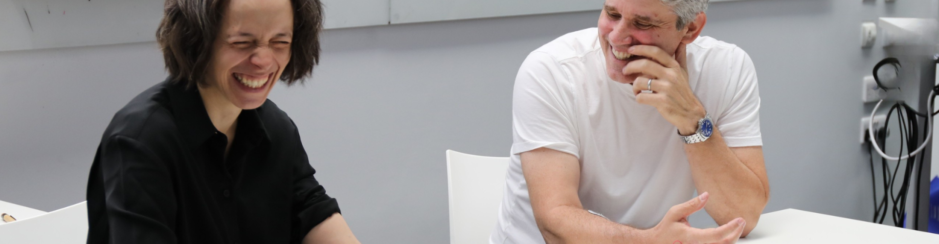 Photo of scientists at SWC demonstrating the Human-Human interface to students