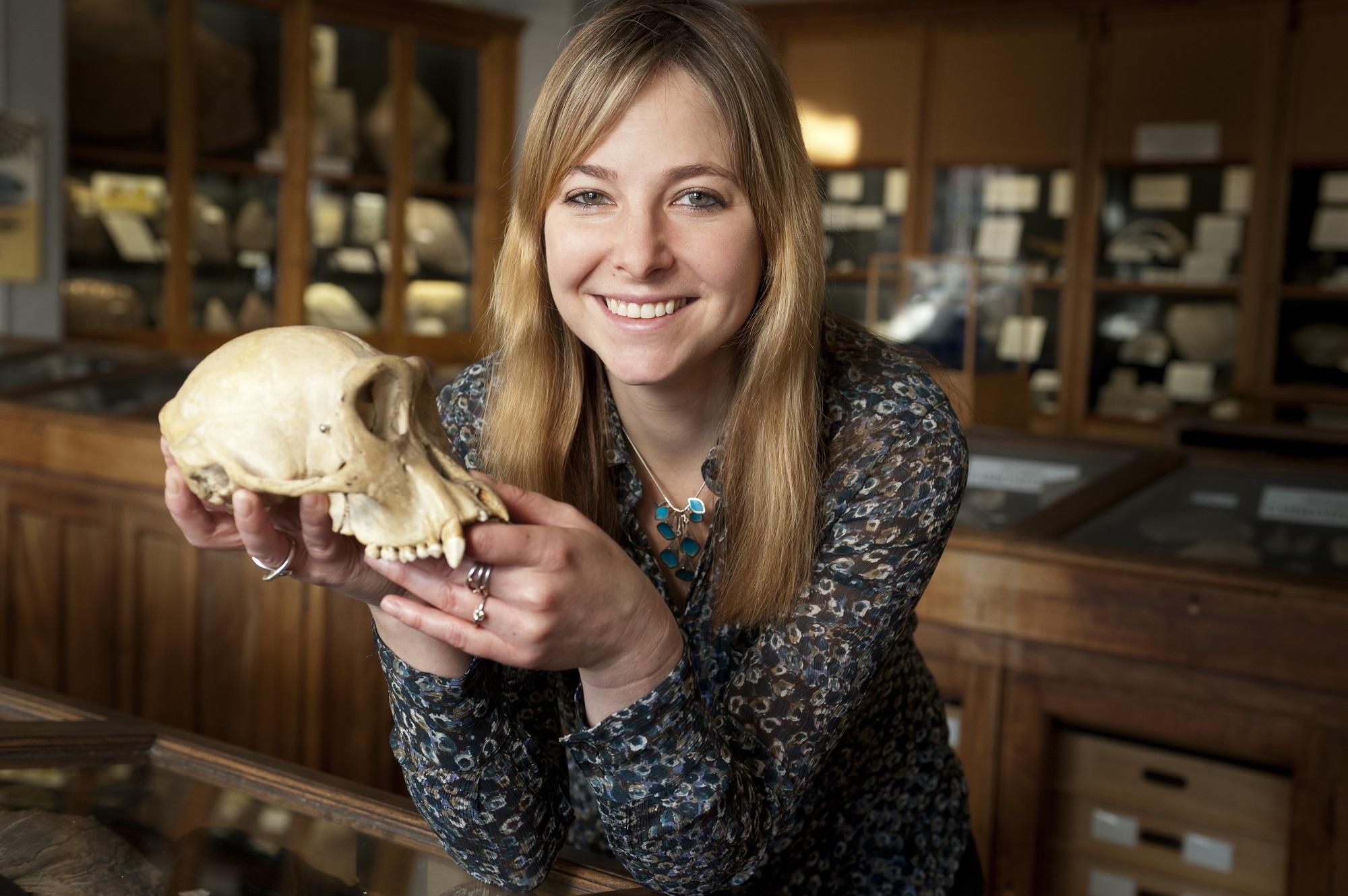 Alice Roberts holding a skull