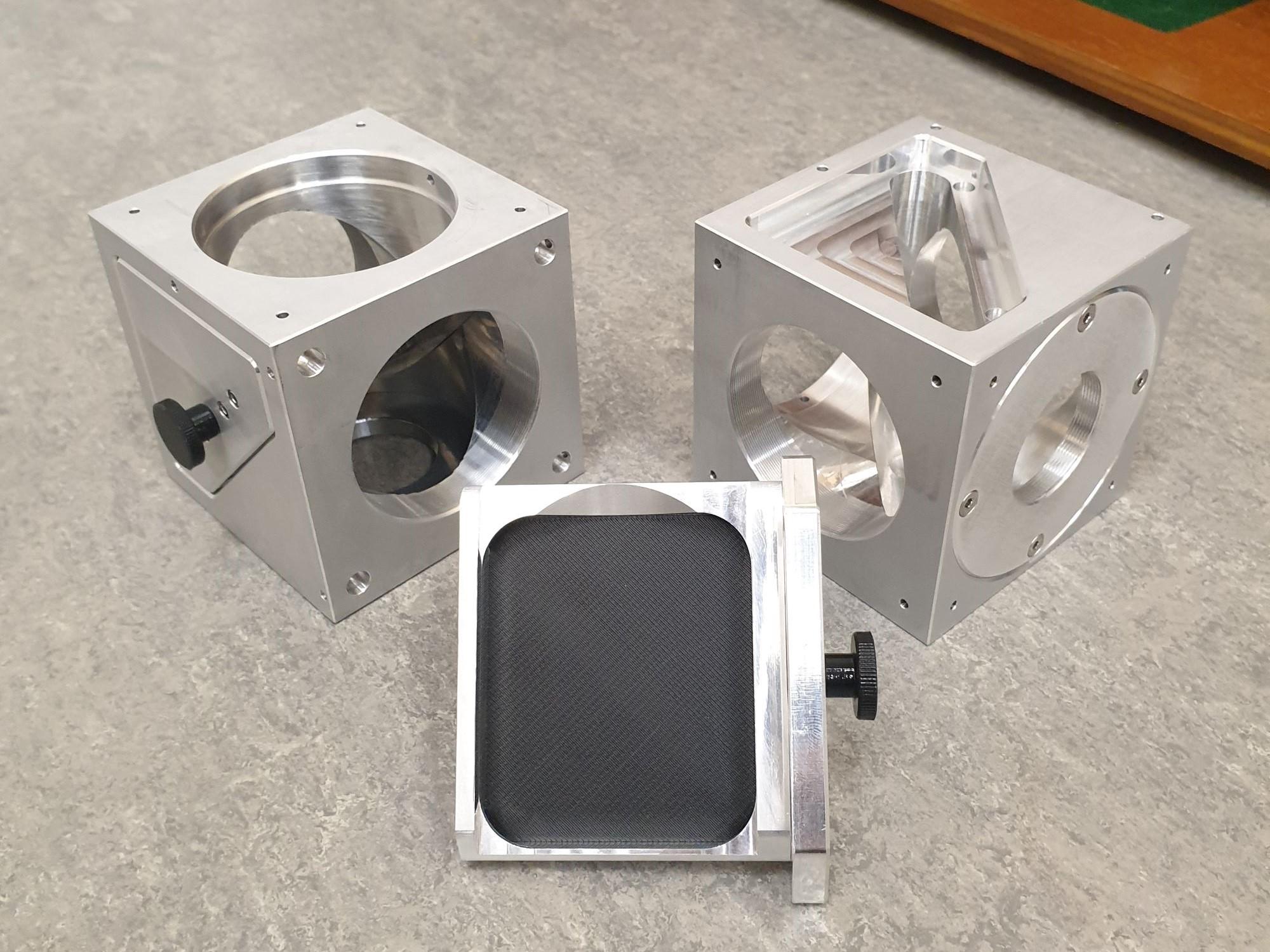 elements of a 2-photon microscope like those that will be milled in the XYZ LR500 CNC 4 Axis Vertical Milling Machine