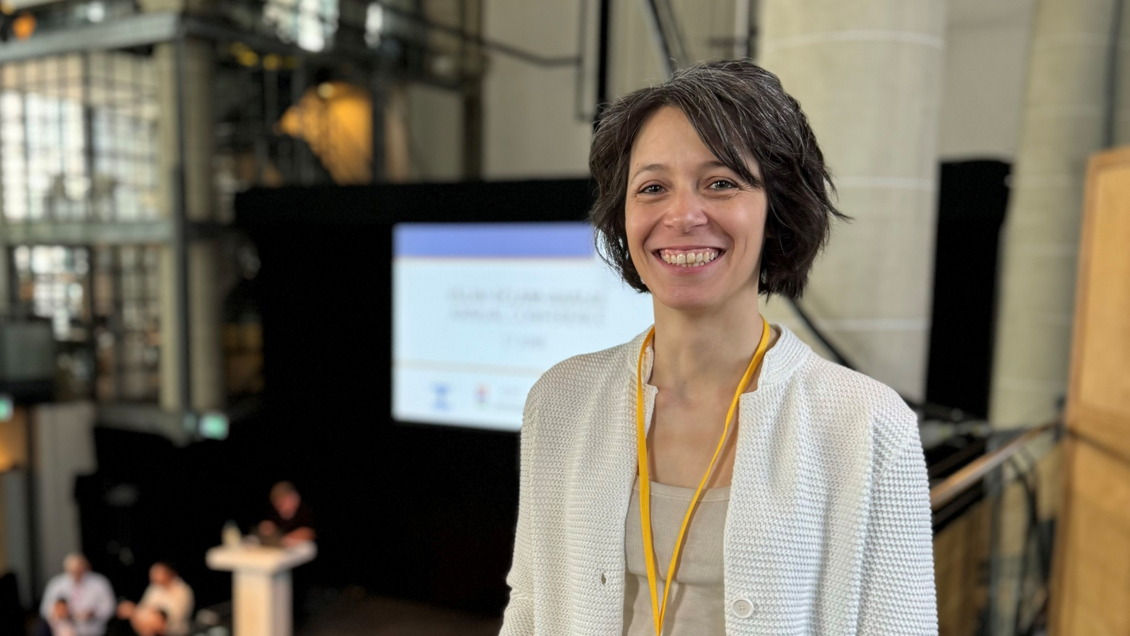 Dr Eleni Amaniti smiling at the conference