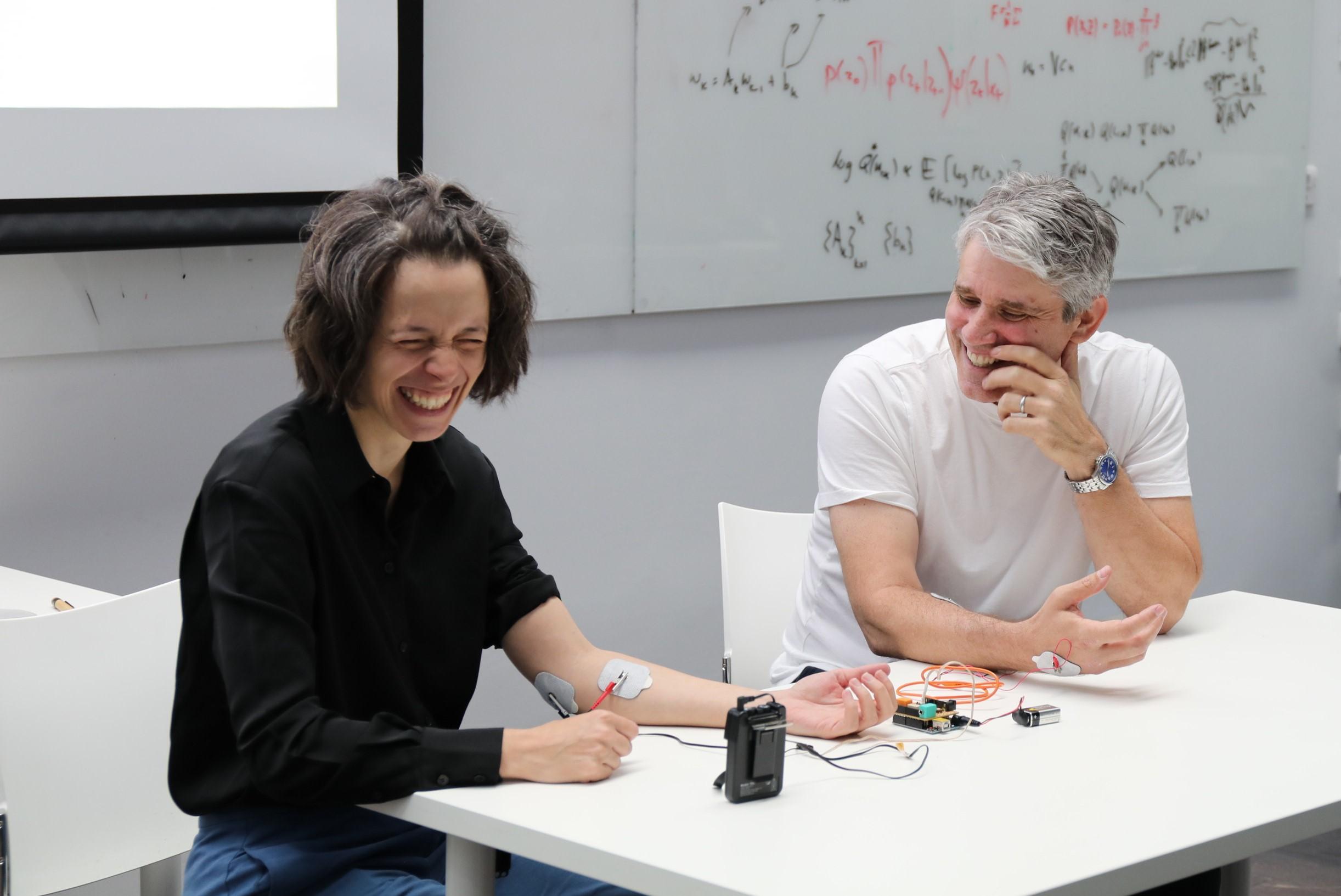 Demonstration of human-human interface device, showing our muscles are controlled with electricity