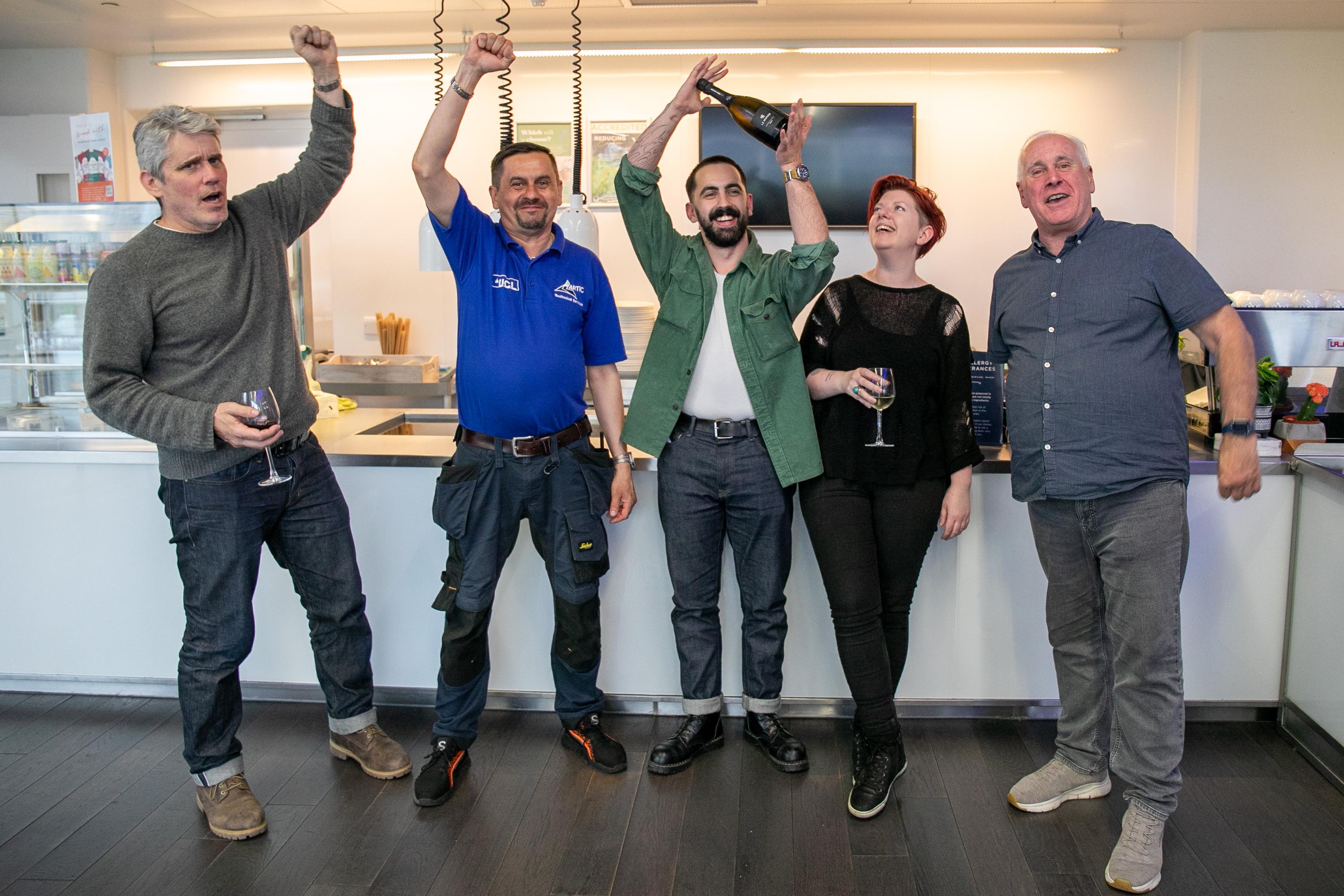 Photo of staff celebrating at SWC sustainability quiz night