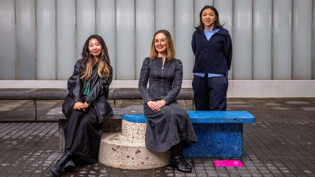 Photo of the Fitz&amp;Sits bench with designers Yaobin Wang and Zixin Ye and April Cashin-Garbutt from the Sainsbury Wellcome Centre
