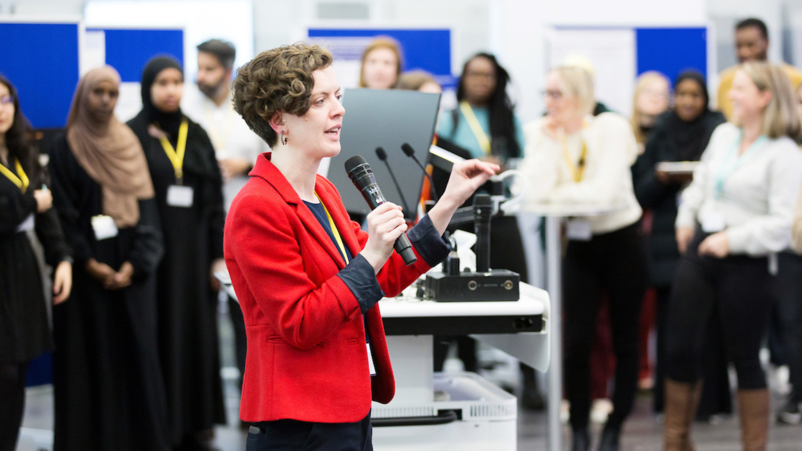 In2research CEO Colby Benari gives talk at celebration event at SWC
