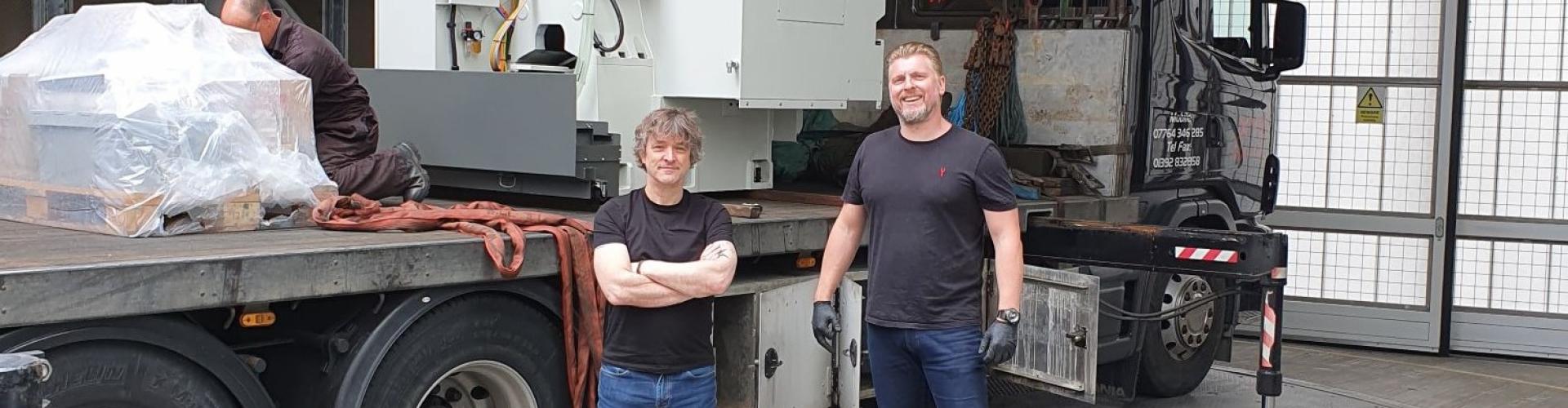FabLabs engineers Del Halpin and Simon Townsend receive the new milling machine at the SWC