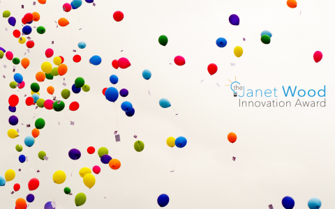 Celebratory balloons in the sky with Janet Wood Innovation Award logo overlaid